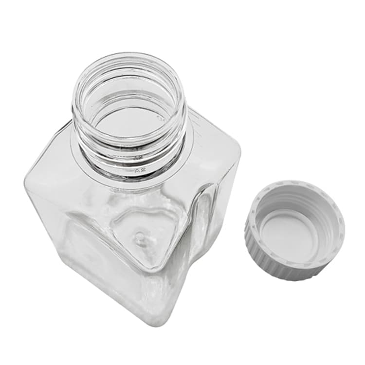 Polycarbonate media bottle neck, opening, and white closure